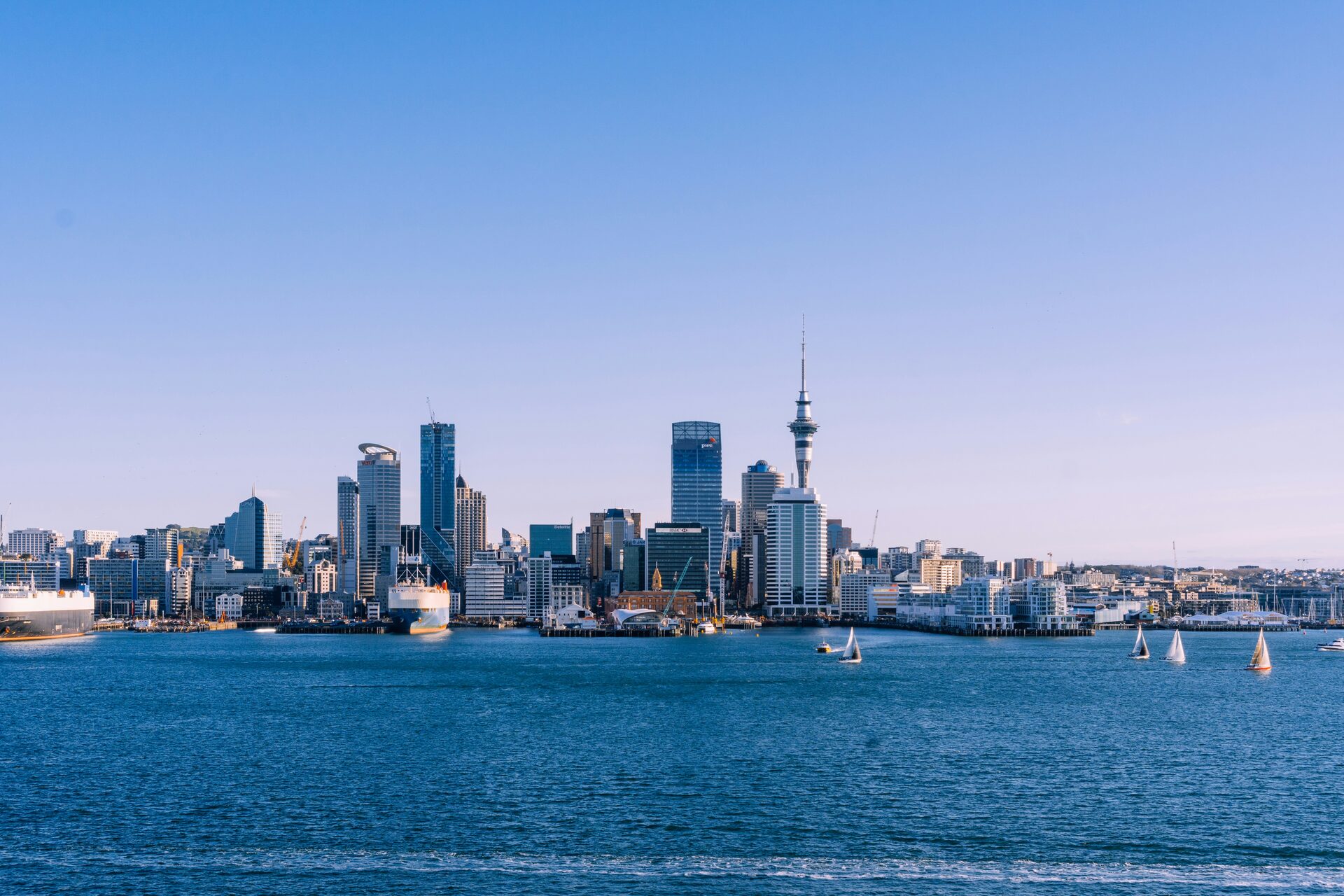 Auckland city skyline viewed from the harbour — Fairweb serves businesses across New Zealand