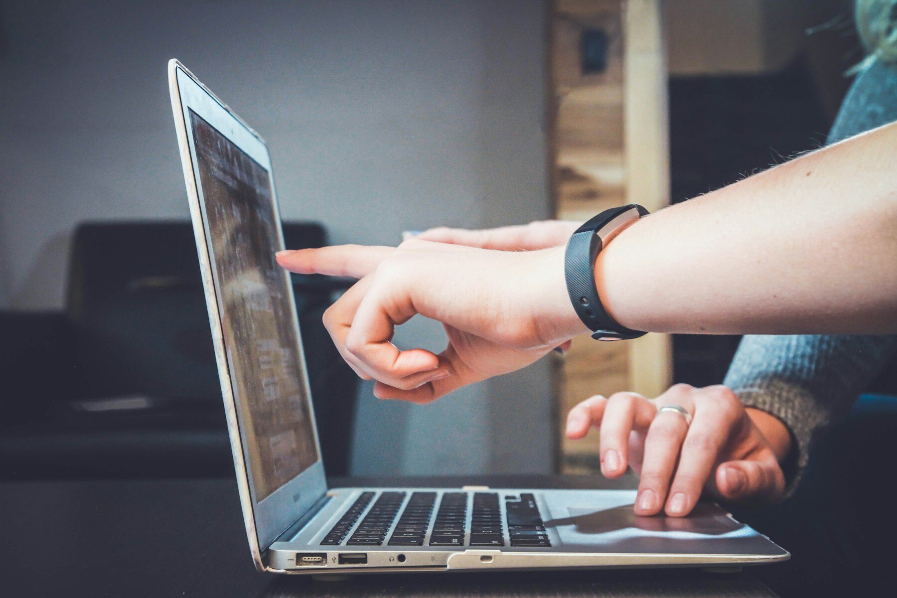 Small business owner working on their website on a laptop — managed website support and ongoing website care for NZ small businesses