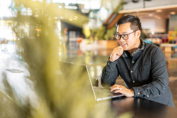 Professional consultant working on a laptop